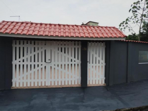 Casa na praia com piscina e churrasqueira
